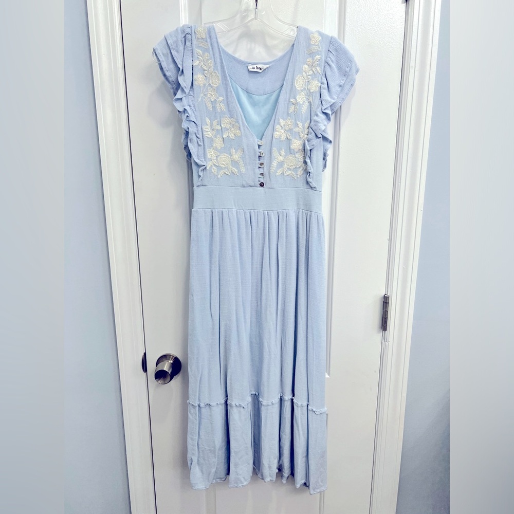 Pink blush maternity: light blue dress with white embroidery